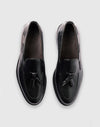 Mocassino con nappine in pelle nera