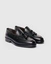 Mocassino con nappine in pelle nera
