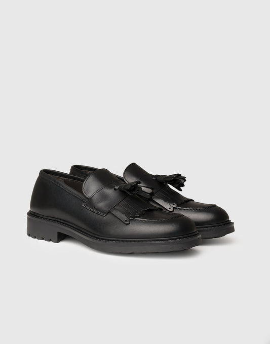 Mocassino in pelle con nappine